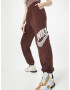 Nike Sportswear Pantaloni ciocolatiu / alb - Pled.ro