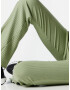 Nike Sportswear Pantaloni verde deschis / negru - Pled.ro