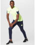 PUMA Pantaloni sport bleumarin / verde limetă - Pled.ro