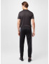 PUMA Pantaloni sport gri deschis / negru - Pled.ro