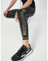 Reebok Pantaloni sport galben neon / negru - Pled.ro