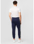 Reebok Sport Pantaloni sport bleumarin / alb - Pled.ro