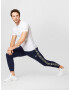 Reebok Sport Pantaloni sport bleumarin / alb - Pled.ro