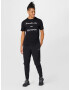 Reebok Sport Pantaloni sport negru / alb - Pled.ro