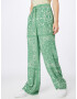 TOMMY HILFIGER Pantaloni verde / alb - Pled.ro