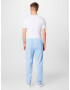 Tommy Jeans Pantaloni albastru deschis - Pled.ro