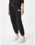 Tommy Jeans Pantaloni albastru / portocaliu / negru / alb murdar - Pled.ro