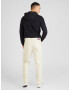 Tommy Jeans Pantaloni bej - Pled.ro