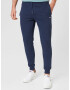 Tommy Jeans Pantaloni bleumarin / roși aprins / alb - Pled.ro