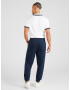 Tommy Jeans Pantaloni bleumarin / roșu intens / alb - Pled.ro