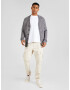 Tommy Jeans Pantaloni cu buzunare 'Austin' crem - Pled.ro