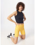 UNDER ARMOUR Pantaloni sport 'Meridian' galben / alb - Pled.ro