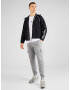 UNDER ARMOUR Pantaloni sport 'Rival' gri amestecat / alb - Pled.ro