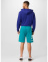 UNDER ARMOUR Pantaloni sport 'Rival' turcoaz / alb - Pled.ro