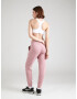 UNDER ARMOUR Pantaloni sport 'Unstoppable' roz deschis / negru - Pled.ro