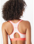 UNDER ARMOUR Sutien sport corai / roz pastel - Pled.ro