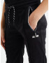 WE Fashion Pantaloni negru / alb - Pled.ro