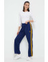 adidas Originals pantaloni de trening culoarea albastru marin cu imprimeu - Pled.ro