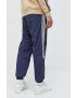 adidas Originals pantaloni de trening Adicolor barbati culoarea albastru marin cu imprimeu - Pled.ro