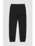 Coccodrillo pantaloni de trening din bumbac pentru copii culoarea negru neted - Pled.ro