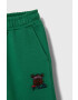 Fila pantaloni de trening pentru copii THALHEIM sweat pants culoarea verde cu imprimeu - Pled.ro