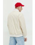 Tommy Jeans geaca bomber barbati culoarea bej de tranzitie oversize - Pled.ro