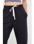 Under Armour pantaloni de trening femei culoarea negru neted - Pled.ro