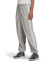 adidas Sportswear Pantaloni sport cu benzi laterale contrastante Essentials - Pled.ro