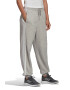 adidas Sportswear Pantaloni sport cu benzi laterale contrastante Essentials - Pled.ro