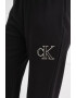 CALVIN KLEIN JEANS Pantaloni de trening din bumbac organic cu croiala ampla - Pled.ro