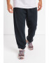 New Balance Pantaloni de trening din amestec de bumbac relaxed fit cu logo - Pled.ro