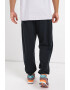 New Balance Pantaloni de trening din amestec de bumbac relaxed fit cu logo - Pled.ro