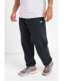 New Balance Pantaloni de trening din amestec de bumbac relaxed fit cu logo - Pled.ro