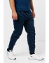 Nike Pantaloni conici cu logo pentru fitness - Pled.ro