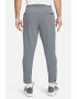 Nike Pantaloni conici cu tehnologie Dri-FIT si slituri cu fermoar Unlimited - Pled.ro