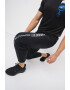 Nike Pantaloni cu tehnologie Dri-Fit imprimeu logo si buzunare oblice pentru fitness - Pled.ro