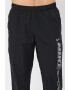 Nike Pantaloni cu tehnologie Dri-Fit imprimeu logo si buzunare oblice pentru fitness - Pled.ro