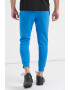 Nike Pantaloni de trening cu buzunare laterale - Pled.ro