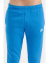 Nike Pantaloni de trening cu buzunare laterale - Pled.ro