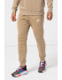 Nike Pantaloni de trening cu buzunare laterale - Pled.ro