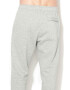 Nike Pantaloni de trening cu buzunare laterale - Pled.ro