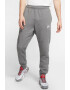 Nike Pantaloni de trening cu buzunare laterale - Pled.ro