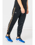 Nike Pantaloni de trening cu logo contrastant Repeat - Pled.ro