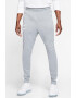 Nike Pantaloni sport conici Swoosh - Pled.ro