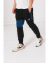 Reebok Pantaloni cu logo pentru fitness Panel - Pled.ro