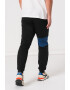 Reebok Pantaloni cu logo pentru fitness Panel - Pled.ro