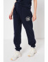 Tommy Hilfiger Pantaloni de trening cu logo Crest - Pled.ro