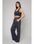 uFIT Set de top crop cu decolteu racerback si pantaloni de trening Lineea - Pled.ro