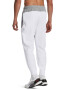 Under Armour Pantaloni conici cu uscare rapida pentru fitness Unstoppable - Pled.ro