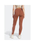 adidas Colanți ESSENTIALS HIGH-WAISTED LOGO IM2858 Maro Tight Fit - Pled.ro